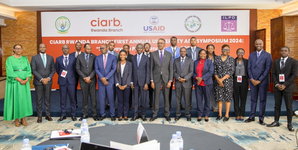 Officials and law experts pose for a group photo at the opening session of the inaugural ADR University Symposium in Kigali, on Wednesday, October 16. While discussing ways to deepen students’ understanding of ADR methods, law experts emphasized the need to bridge gaps in Alternative Dispute Resolution training and encourage the development of the next generation of dispute resolvers. Photo: Courtesy