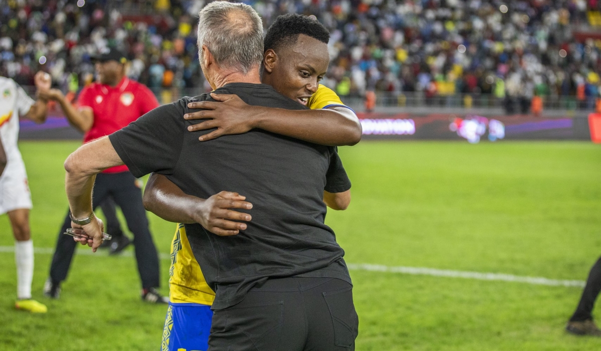 Amavubi head coach Frank Spittler cheers on goal scorer ,striker Innocent Nshuti after a 2-1 victory over Benin at Amahoro Stadium. Photo by Emmanuel Dushimimana