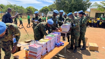 Rwandan peacekeepers from RwanBatt1 sort scholastic materials during a handover event at Kapuri Primary School, on the outskirts of South Sudan’s capital Juba on Monday, October 14. Courtesy