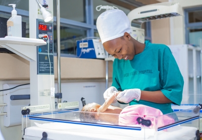 A nurse takes care of a newborn at Kirehe Hospital. Surrogacy is a form of third-party reproductive practice in which the intending parent(s) contract a surrogate mother to give birth to a child. File 