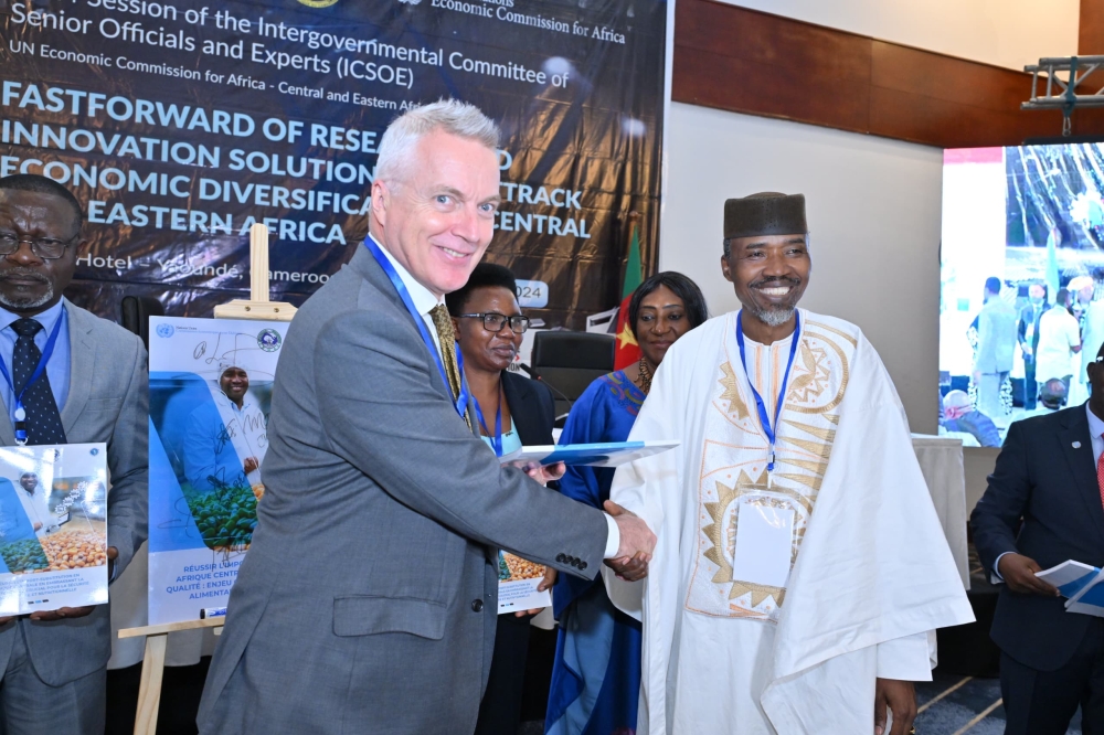 Andrew Mold,  Acting Director of the sub-regional office for East Africa at UNECA and  Adama Ekberg Coulibaly, UNECA&#039;s Lead Economist at the Sub-Regional Office for Central Africa, at the launch of the report in Yaounde Cameroon on Wednesday, October 16. Courtesy