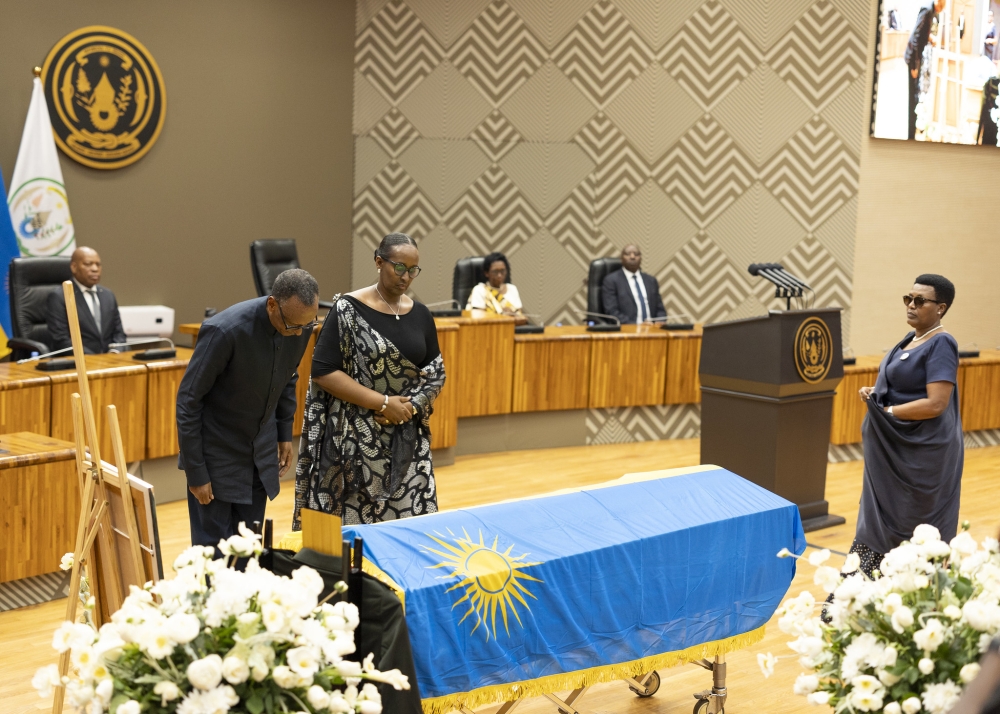 President Paul Kagame and First Lady Jeannette Kagame pay tribute to former minister Joseph Karemera during the farewell ceremony on Wednesday, October 16. Photo by Village Urugwiro