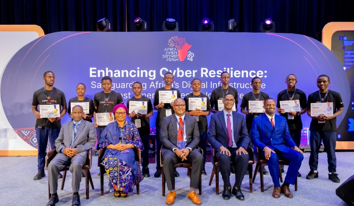 Officials and Rwandan youth who won in the inaugural national Cyberlympics that took place on the margins of the ongoing Africa Cyber Defence Forum (ACDF). Courtesy