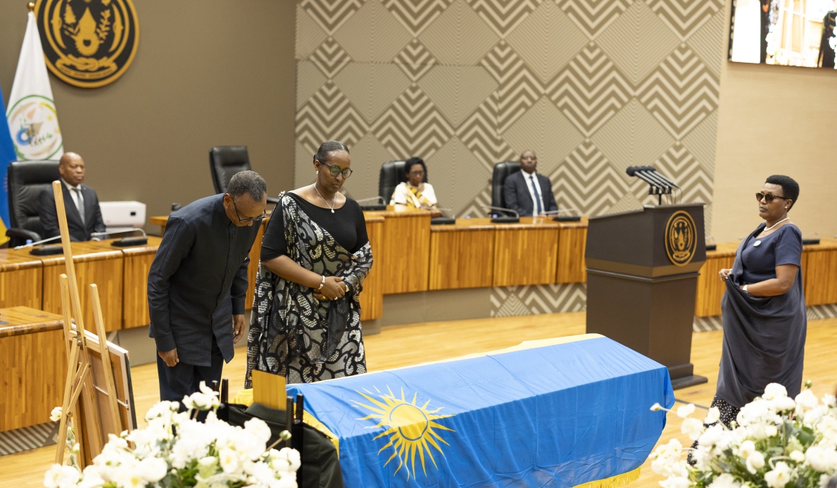 President Paul Kagame and First Lady Jeannette Kagame pay tribute to former minister Joseph Karemera during the farewell ceremony on Wednesday, October 16. Photo by Village Urugwiro