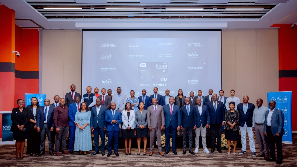 Ecobank Rwanda Plc officials pose with customers during the official introduction of the Visa Infinite Card on Thursday, October 17. Photos by Craish Bahizi