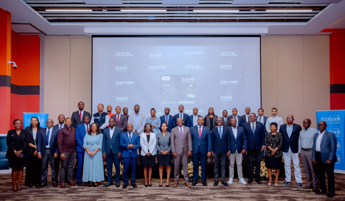 Ecobank Rwanda Plc officials pose with customers during the official introduction of the Visa Infinite Card on Thursday, October 17. Photos by Craish Bahizi