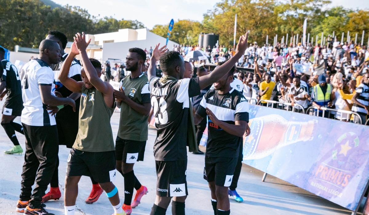 APR FC players and fans celebrate the victory against Rayon Sports at Kigali Pele Stadium on Saturday, March 9. Photo by Craish Bahizi 