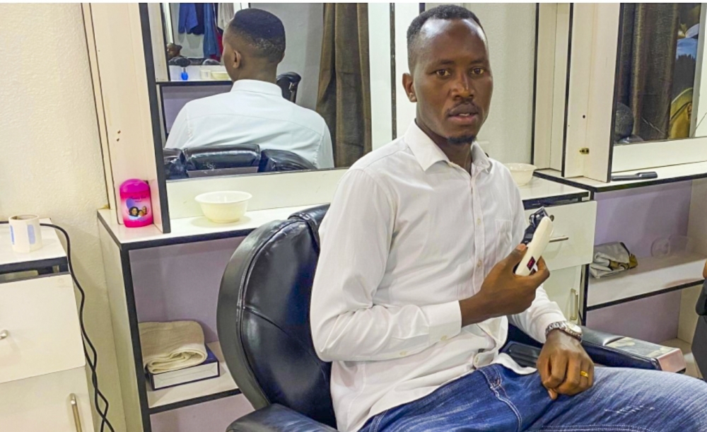 Anastase Mvuyekure, better known as Eric to his clients, is a barber in Nyamirambo. PHOTOS BY ERIC BRIGHT KAYOMBAYIRE