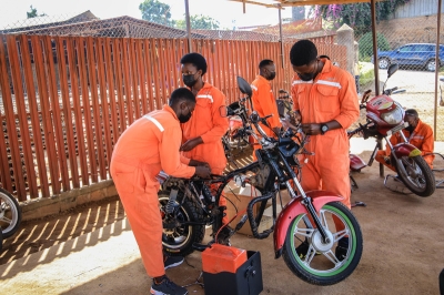 Technicians retrofitting of fossil fuel motorcycles to electric motorcycles at Rwanda Electric Mobility Ltd in Kicukiro district on June 10, 2021.