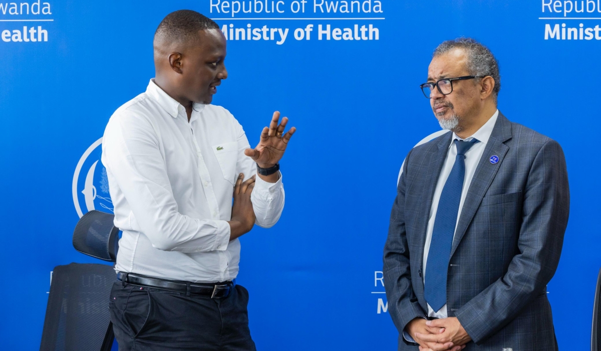 Minister of State for Health Dr Yvan Butera interacts with Director-General of the World Health Organisation (WHO) Dr Tedros Adhanom Ghebreyesus in Kigali on Saturday, October 19. Courtesy