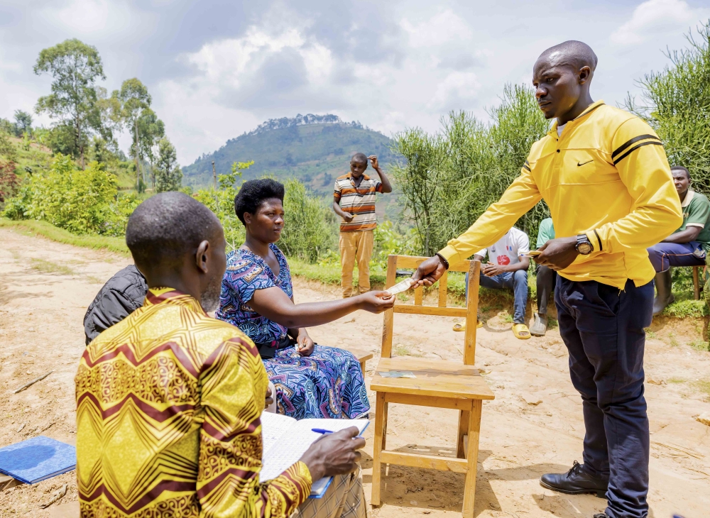 Members of Kabaya Saving Group give their contribution. Residents realised that overcoming poverty depended on their own efforts, after a six-month training in 2021