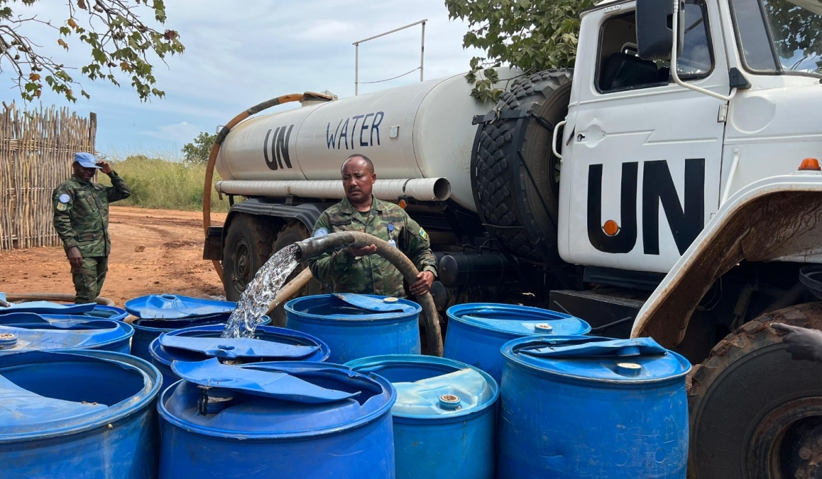 Rwandan peacekeepers from the UN Mission in South Sudan provide water to local communities in Ahmadi village, Juba, Central Equatorial State, during humanitarian activities, on Friday, October 2024.