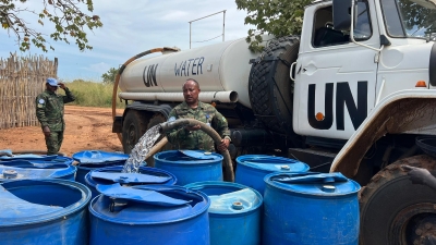 Rwandan peacekeepers from the UN Mission in South Sudan provide water to local communities in Ahmadi village, Juba, Central Equatorial State, during humanitarian activities, on Friday, October 2024.