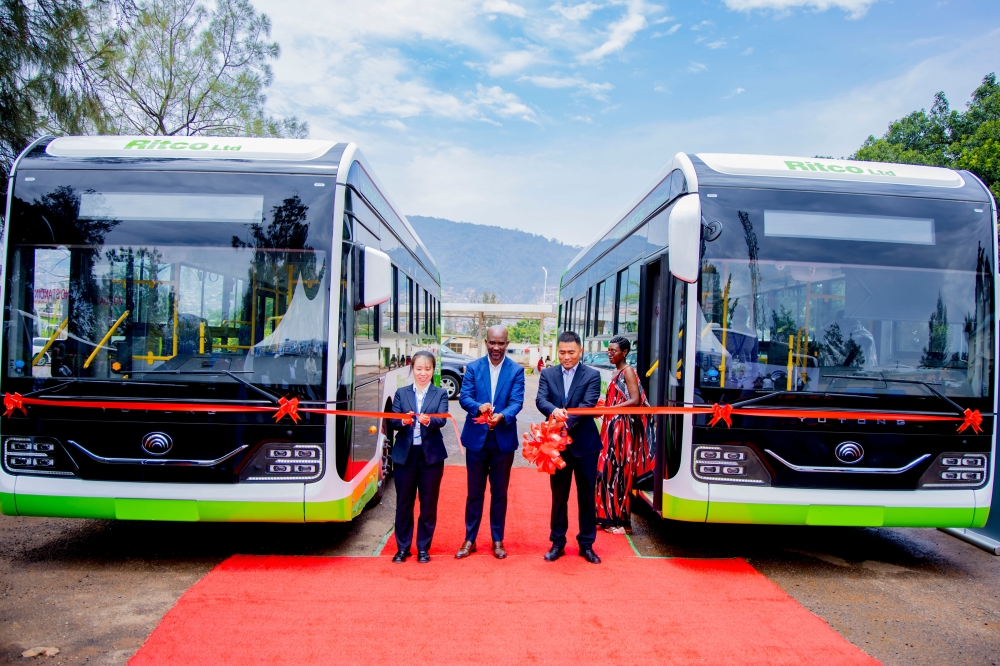 Officials cut ribbon during the handover of new electric buses that were imported by RITCO, in Kigali  on October 18. Courtesy