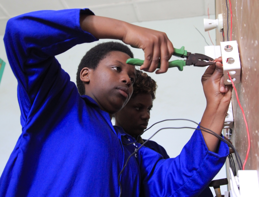 Students during an electrical installation exercise at Musanze Polytechnic. Photo: Sam Ngendahimana.