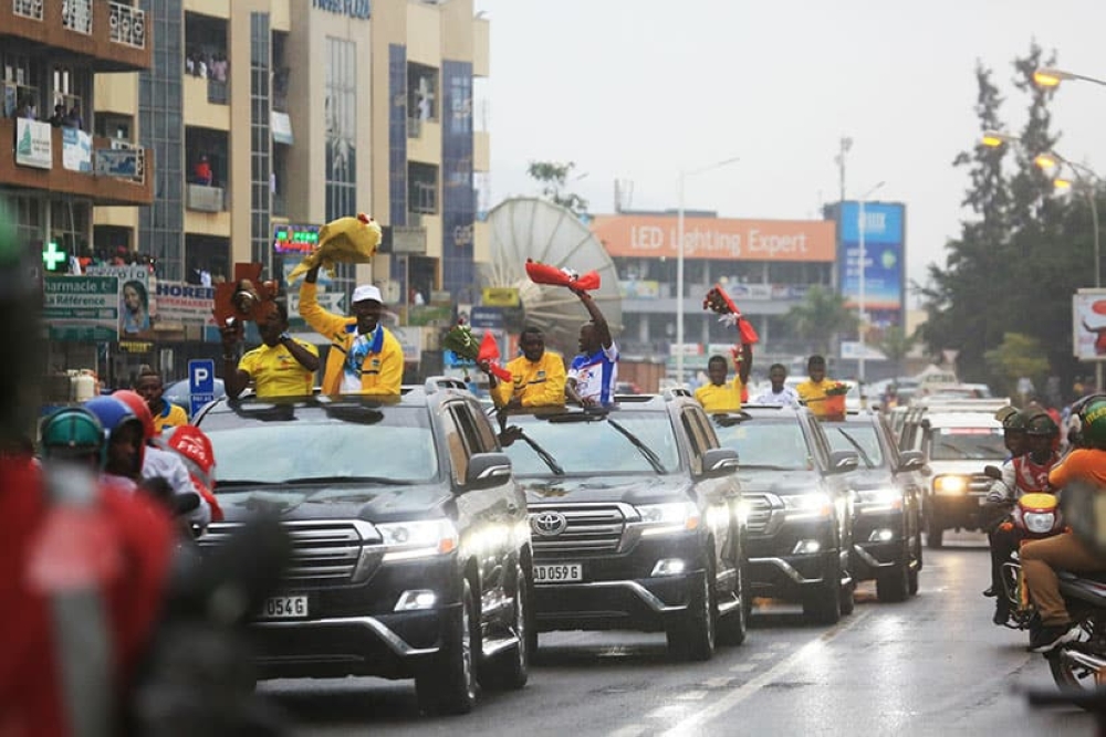 A fanfare reception to Team Rwanda riders after winning La Tropicale Amissa Bongo in February 2018. Captured here at Kisimenti heading to Petit Stade for the official ceremony after a colorful parade from Kigali International Airport to Amahoro Stadium to welcome them. The Winning team was made by Joseph Areruya, Valens Ndayisenga, Didier Munyaneza, Bonaventure, Rene Ukiniwabo, and Jean Ruberwa under Felix Sempoma coaching instructions. Photos by Sam Ngendahimana