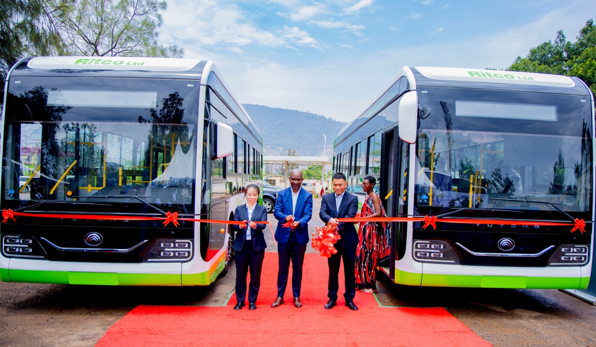 Officials cut ribbon during the handover of new electric buses that were imported by RITCO, in Kigali  on October 18. Courtesy