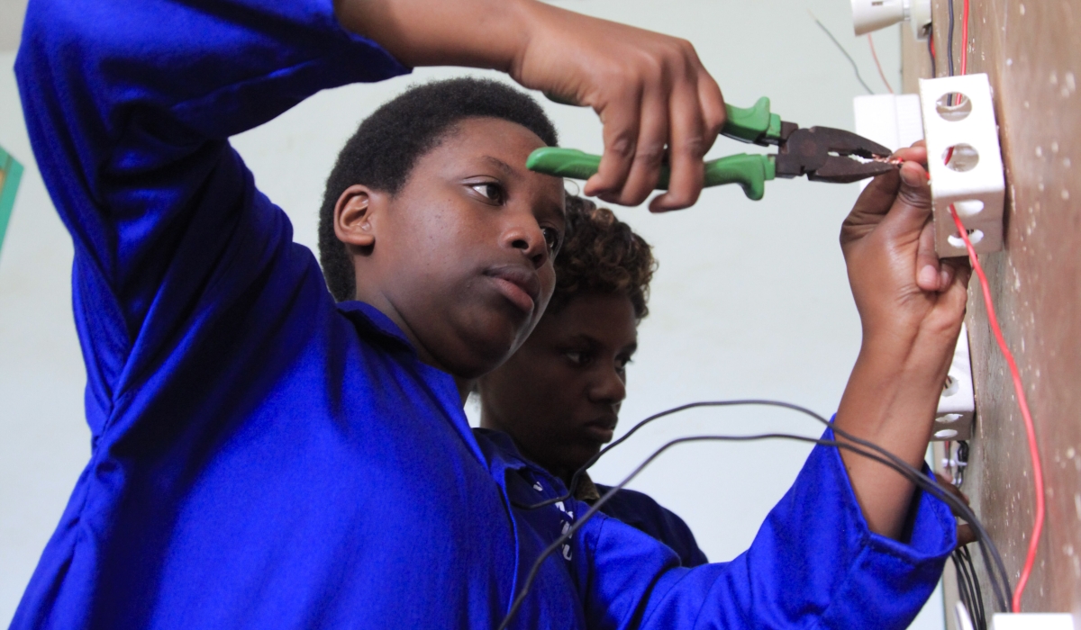 Students during an electrical installation exercise at Musanze Polytechnic. Photo: Sam Ngendahimana.