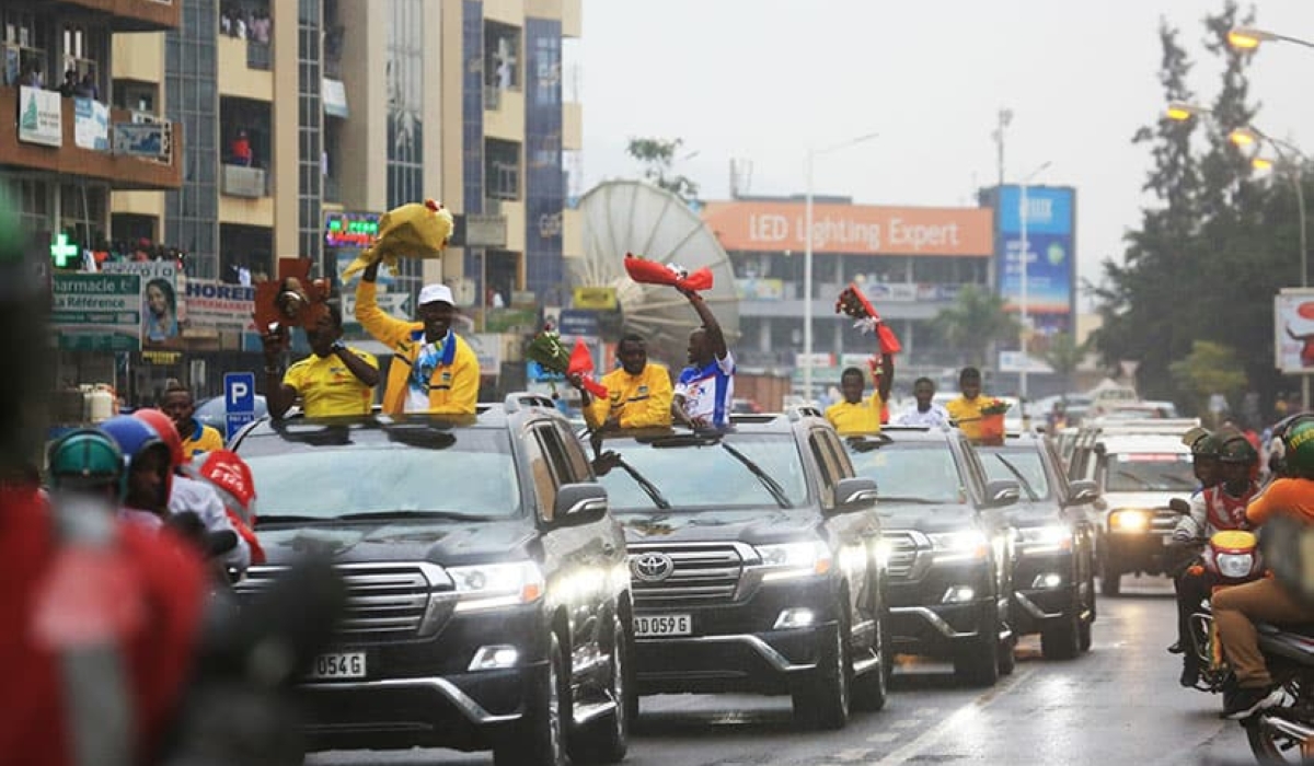 A fanfare reception to Team Rwanda riders after winning La Tropicale Amissa Bongo. Captured here at Kisimenti heading to Petit Stade for the official ceremony after a colorful parade to welcome them. Photos by Sam Ngendahimana