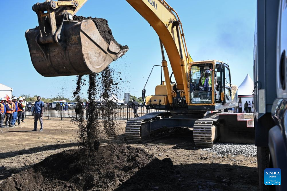 Kenyan President William Ruto operates a bulldozer during the groundbreaking ceremony for the construction of a geothermal power plant in Nakuru county, Kenya, on Oct. 24, 2024. (Xinhua/Han Xu)