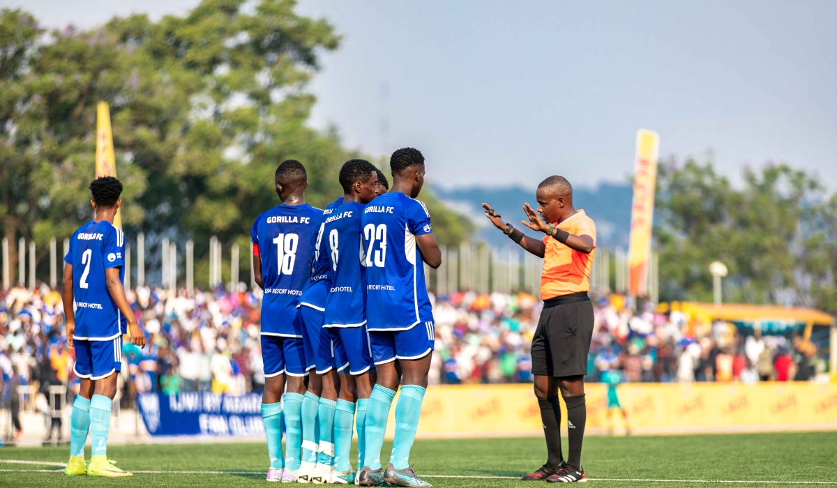 Referee instructing  Gorilla FC players during a free kick of Rayon sport at Pele stadium on July 20. Photo by Craish Bahizi