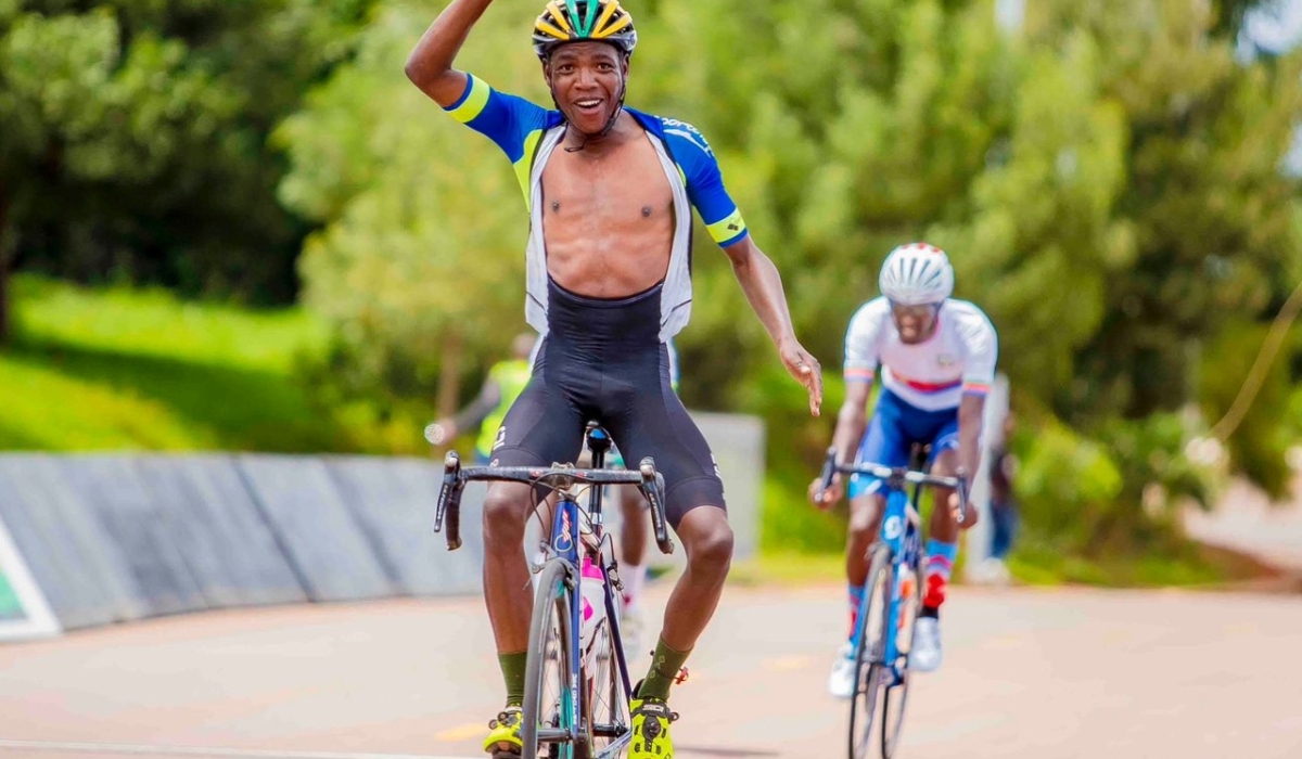 Eric Manizabayo celebrates the victory as he won the 8th edition of Race to Remember in Kigali on Sunday April 28.