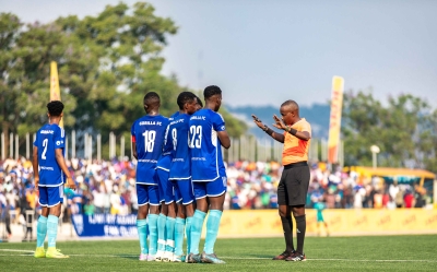 Referee instructing  Gorilla FC players during a free kick of Rayon sport at Pele stadium on July 20. Photo by Craish Bahizi