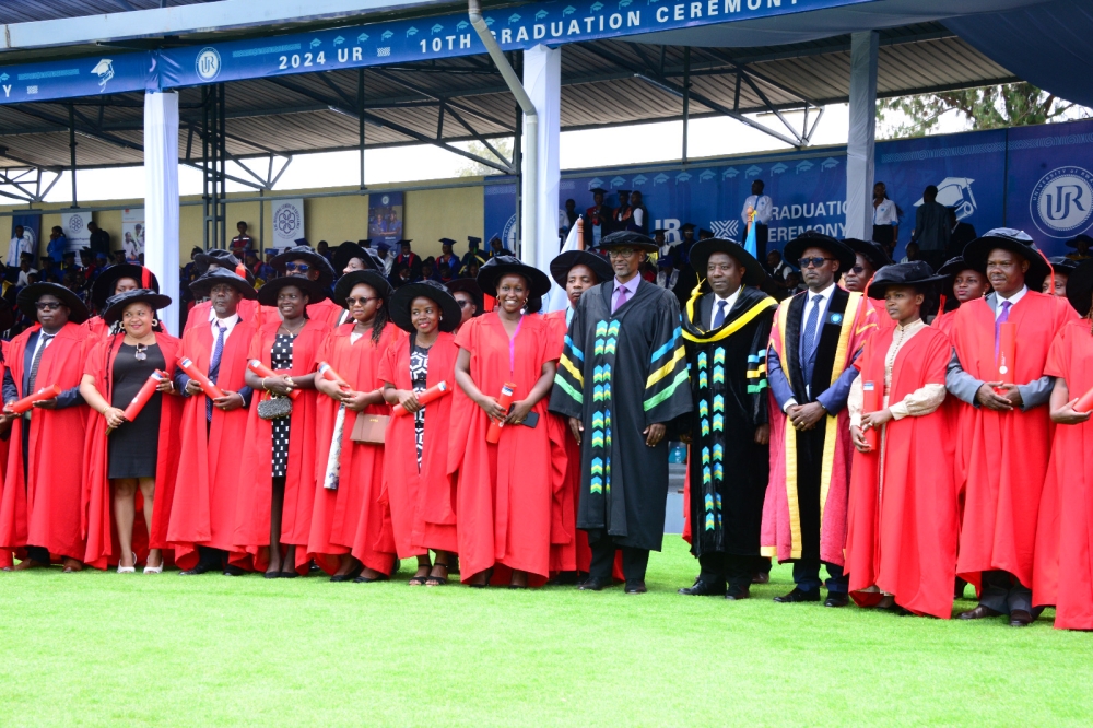 Prime Minister Edouard Ngirente poses for a photo with the graduates who were trained at the African Centre of Excellence in Internet of Things. Courtesy