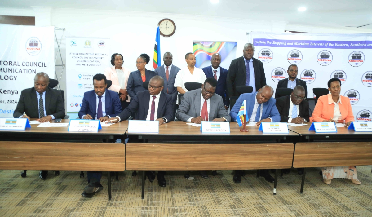 Kenya’s Cabinet Secretary for Roads and Transport, Davis Chirchir, and EAC Partner States Ministers sign the report of the 19th Sectoral Council on Transport, Communications and Meteorology in Mombasa, Kenya. Also in the photos are the EAC Deputy Secretary General in charge of Infrastructure, Productive, Social and Political Sectors, Andrea Aguer Ariik and Partner States’ Permanent/Principal Secretaries.