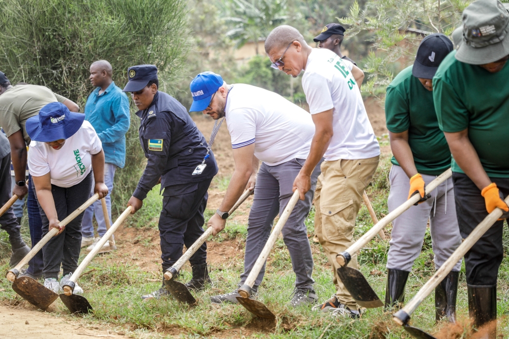 Kigali Water Ltd officials join Bugesera residents at the annual Tree Planting Day in Kanzenze cell, Ntarama sector, during Umuganda community service. Photos: Craish Bahizi.