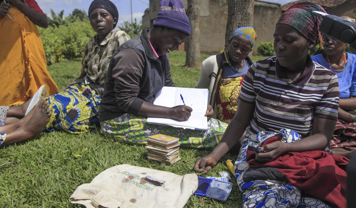 Women in Dufashanye cooperative collect their weekly contribution in their saving scheme in Muko Sector Musanze District. Sam Ngendahimana