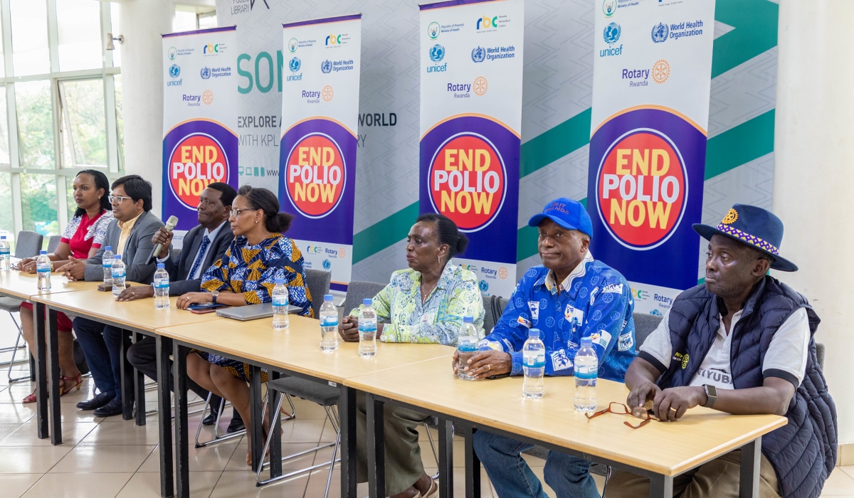 Members of the Club of Kigali Karisimbi, Kigali Virunga, Kigali Cosmopolitan, the Club of Kigali Seniors, and other Rotarians, address media about fighting polio in Rwanda. Craish Bahizi