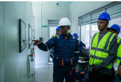 Prime Energy&#039;s engineer gives a tour of Mukungwa II to investors during the company&#039;s Investor Day in Musanze District. Prime Energy raises Rwf9.58 billion in inaugural green bond. Photo by Dan Gatsinzi.