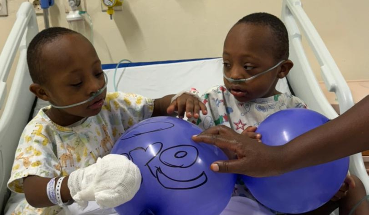 Christophe and Christian Ndayisaba during their admission at King Faisal Hospital when they began experiencing respiratory issues