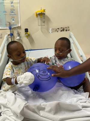 Christophe and Christian Ndayisaba during their admission at King Faisal Hospital when they began experiencing respiratory issues