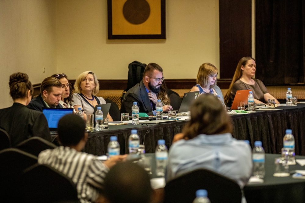 Attendees follow a presentation during the meeting to plan the establishment of the Centre for Nuclear Science and Technology (CNST), held at Kigali Serena Hotel on Wednesday, October 30