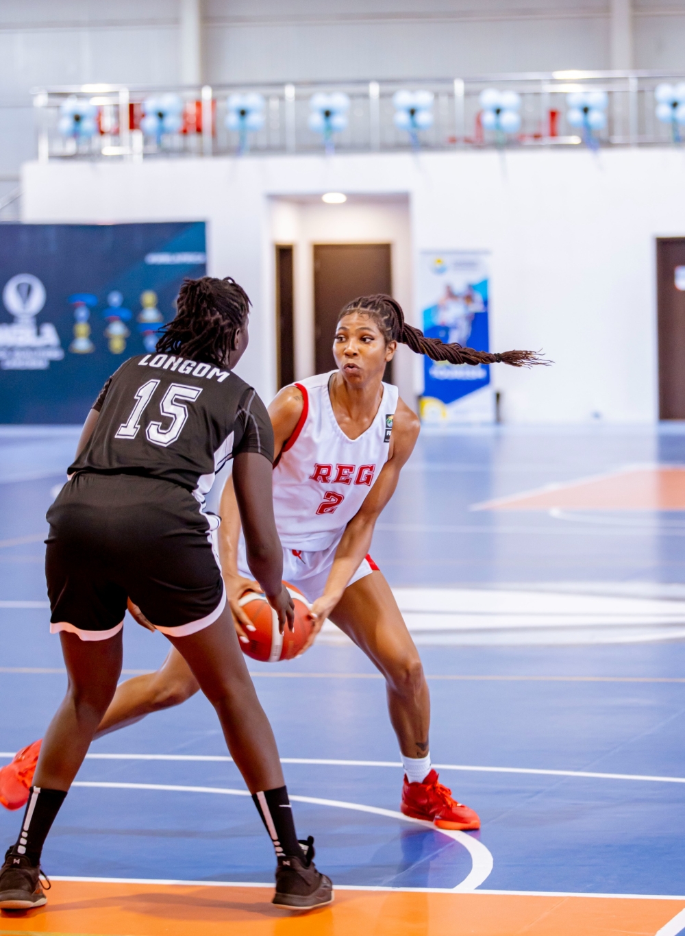 REG Women star Krsitina Morgan King tries to get past her JKL Lady Dolphins opponent during Thursday&#039;s quarterfinal match-courtesy