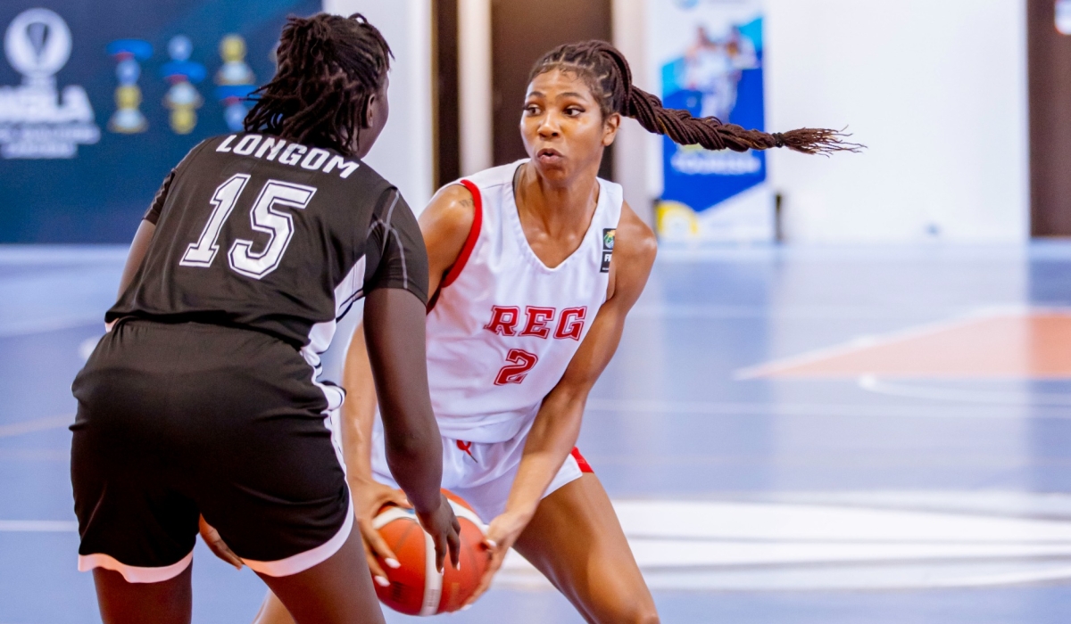 REG Women star Krsitina Morgan King tries to get past her JKL Lady Dolphins opponent during Thursday&#039;s quarterfinal match-courtesy