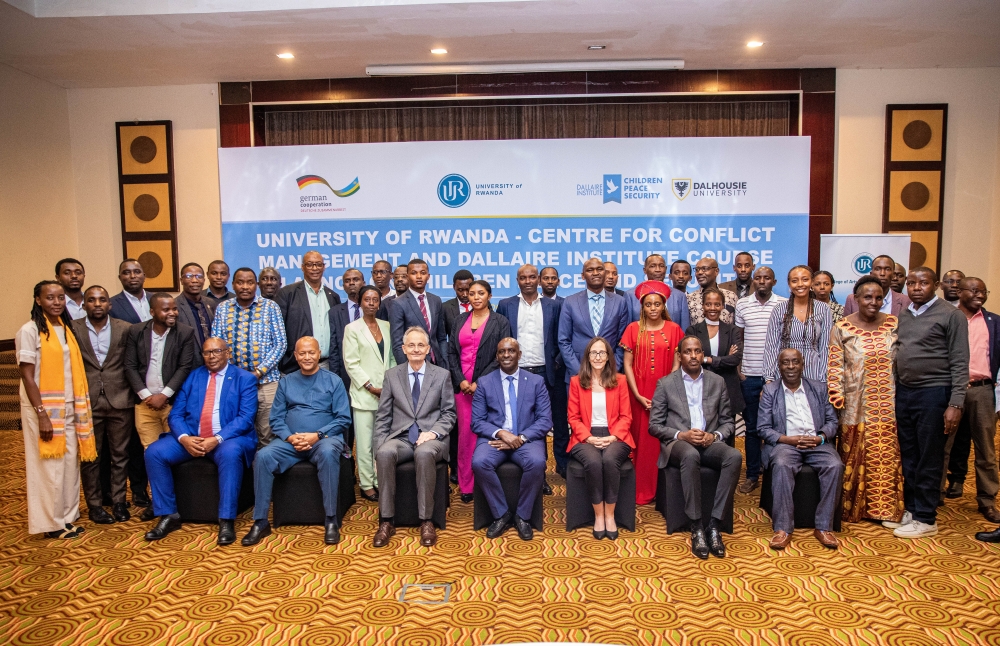 Dallaire Institute and  University of Rwanda (UR) officials pose for a group during the  launch of a short course on Wednesday, October 23, Photos by Dan Gatsinzi