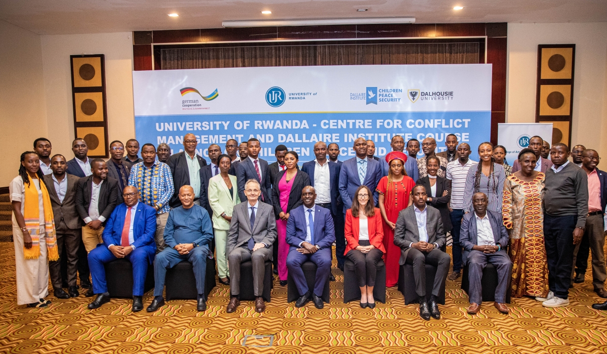 Dallaire Institute and  University of Rwanda (UR) officials pose for a group during the  launch of a short course on Wednesday, October 23, Photos by Dan Gatsinzi