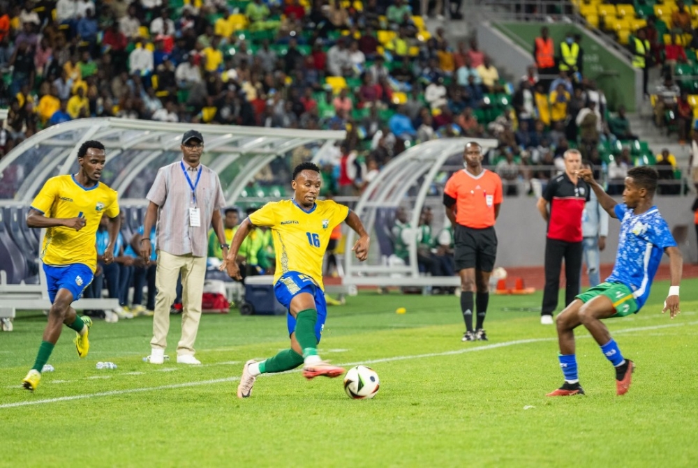 Dushimimana (L) in action against Djibouti. The APR forward netted a brace in the game. Photo by Emmanuel Dushimimana