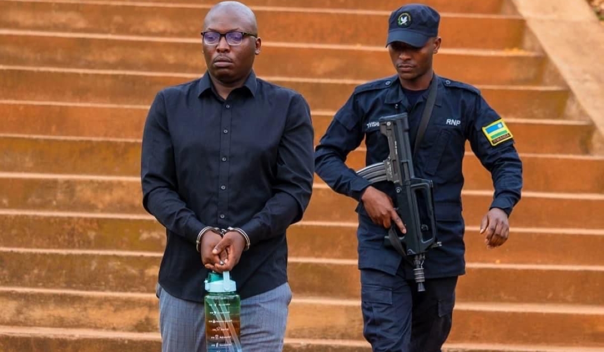 Rwandan showbiz journalist Jean Bosco Sengabo alias Fatakumavuta (L) arrives at Kicukiro Primary Court ahead of the hearing on Tuesday, November 5-courtesy