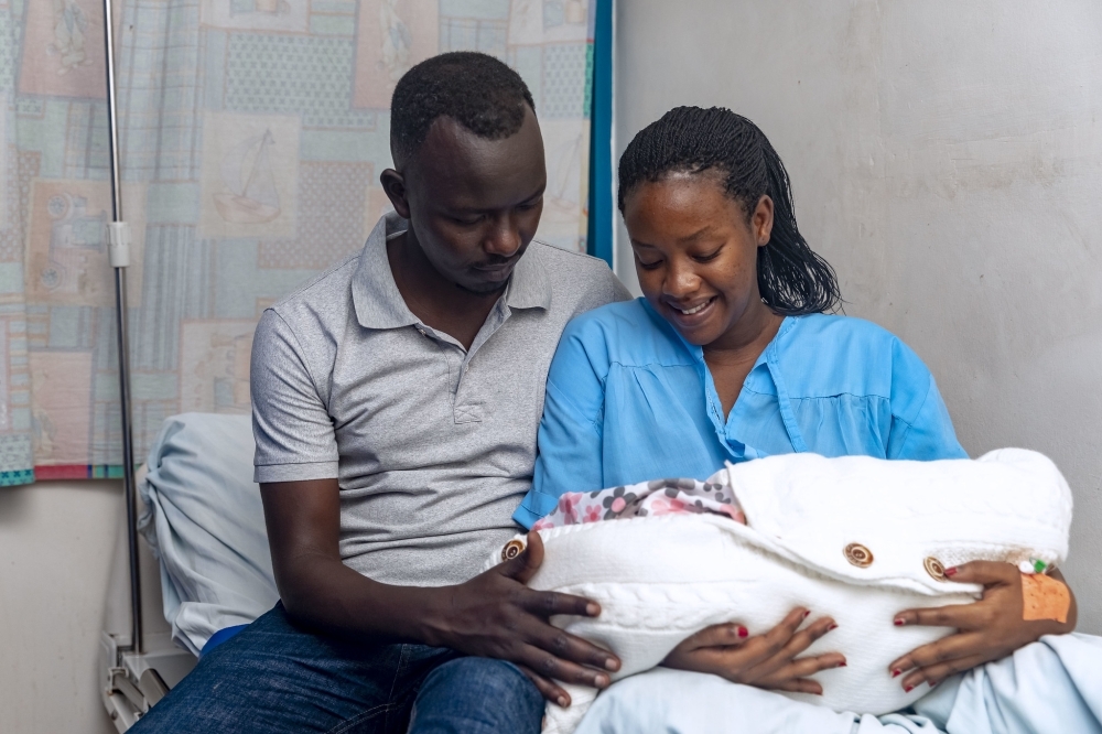 Winnie Mutesi and her husband with their newborn baby at Hospital La Croix du Sud in Kigali, on  December 25. Reproductive technologies mean fertility treatments and procedures that assist couples with difficulties conceiving children. File Photo  