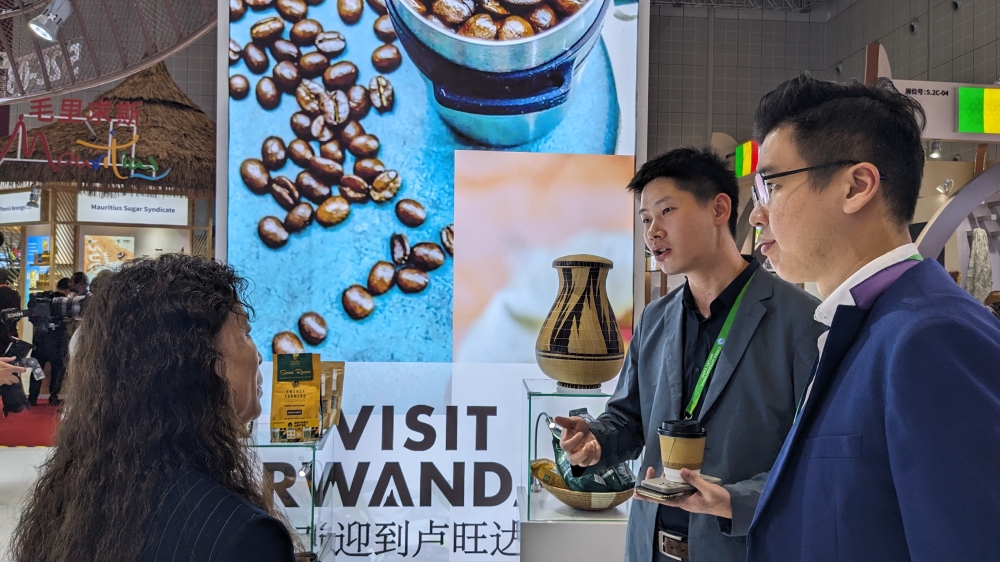 Visitors interact at the Rwandan pavilion at the China International Import Expo on Tuesday, November 5, 2024.