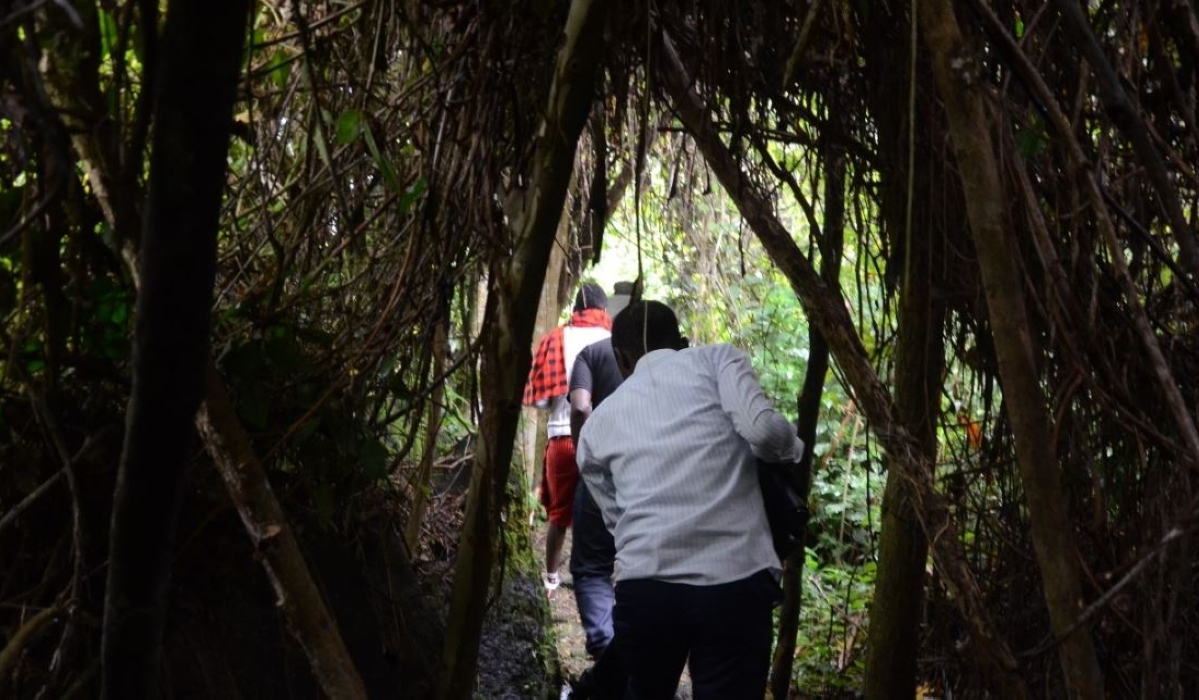 Local visitors during a guided tour of Buhanga Eco-Park in Musanze District. According to a new ministerial order, Buhanga forest is now part of Volcanoes National Park, Ngendahimana