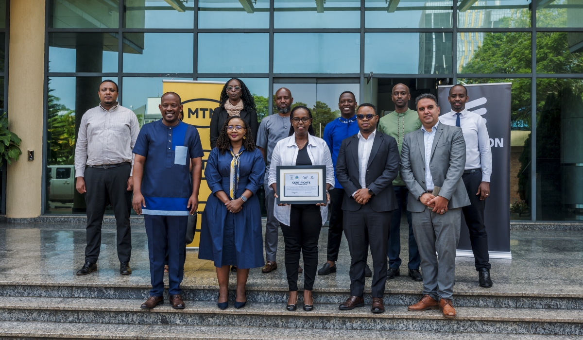 MTN Rwanda and Ericsson staff presenting a certificate of appreciation to the Mayor of City of Kigali Mayor, Samuel Dusengiyumva,  marking the completion of the Kigali network modernization project. Courtesy 