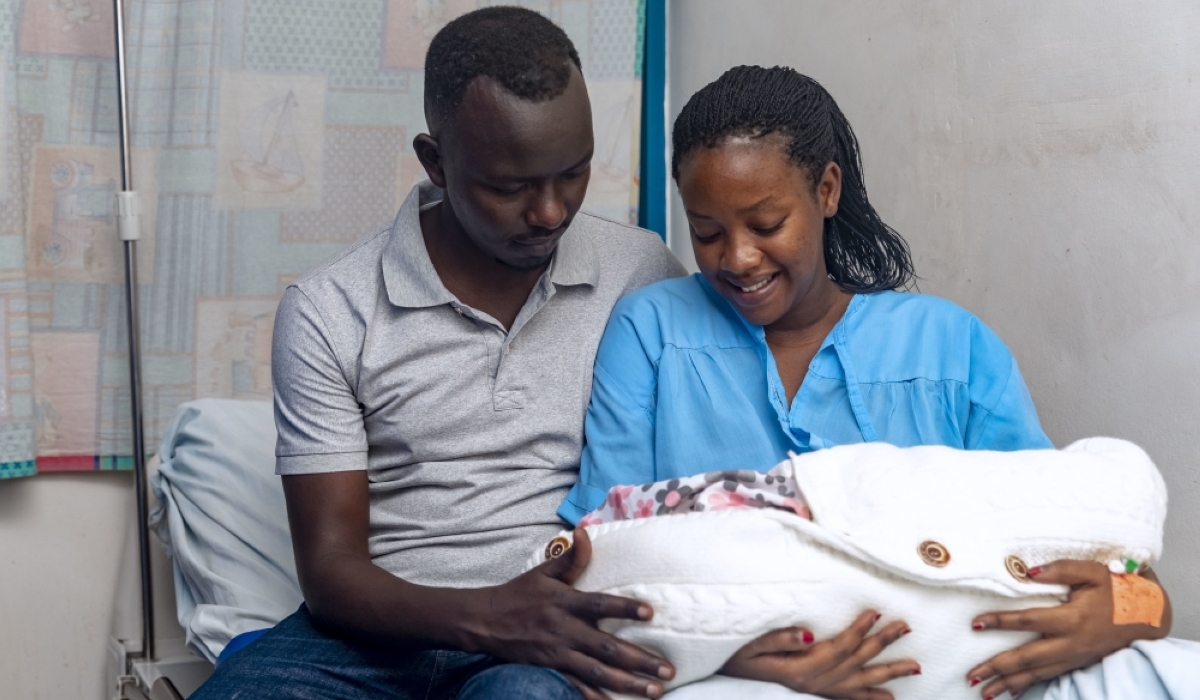 Winnie Mutesi and her husband with their newborn baby at Hospital La Croix du Sud in Kigali, on  December 25. Reproductive technologies mean fertility treatments and procedures that assist couples with difficulties conceiving children. File Photo  