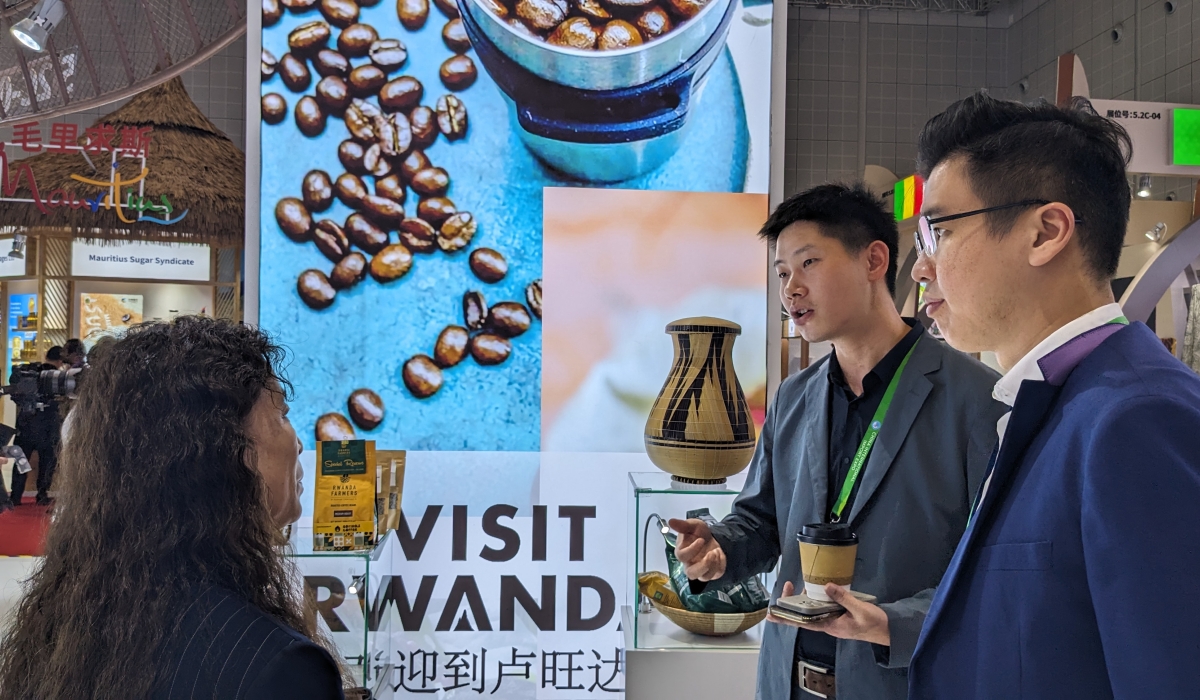 Visitors interact at the Rwandan pavilion at the China International Import Expo on Tuesday, November 5, 2024.