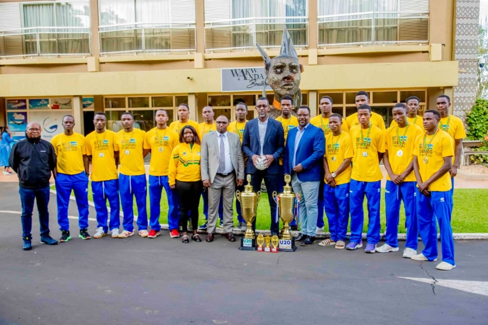 Sports Minister Richard Nyirishema poses for a photo with Rwanda U20 team that won the 2024 IHF Trophy Continental Phase in Addis Ababa, Ethiopia-courtesy