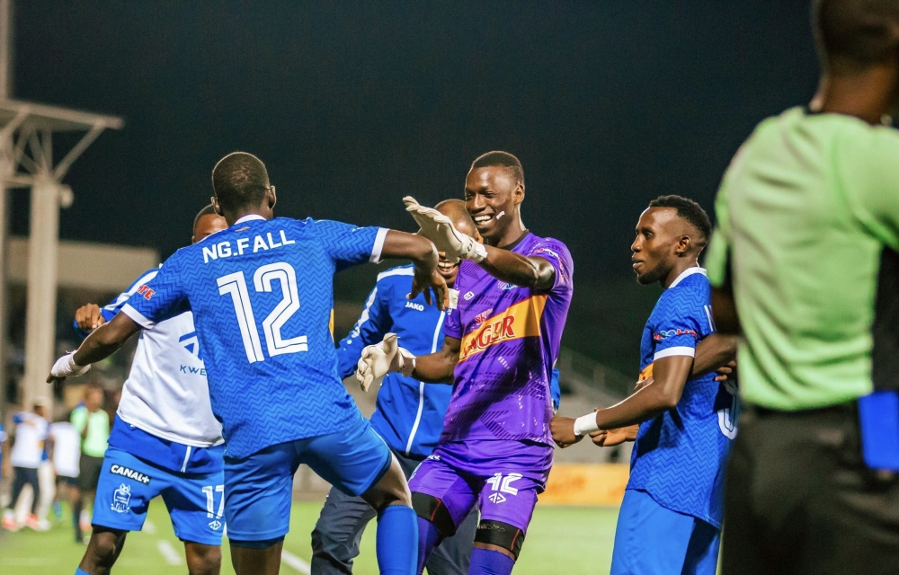 Senegalese forward Fall Ngagne is joined by teammates in celebration as his matchwinner powered Rayon at the top of the table-courtesy